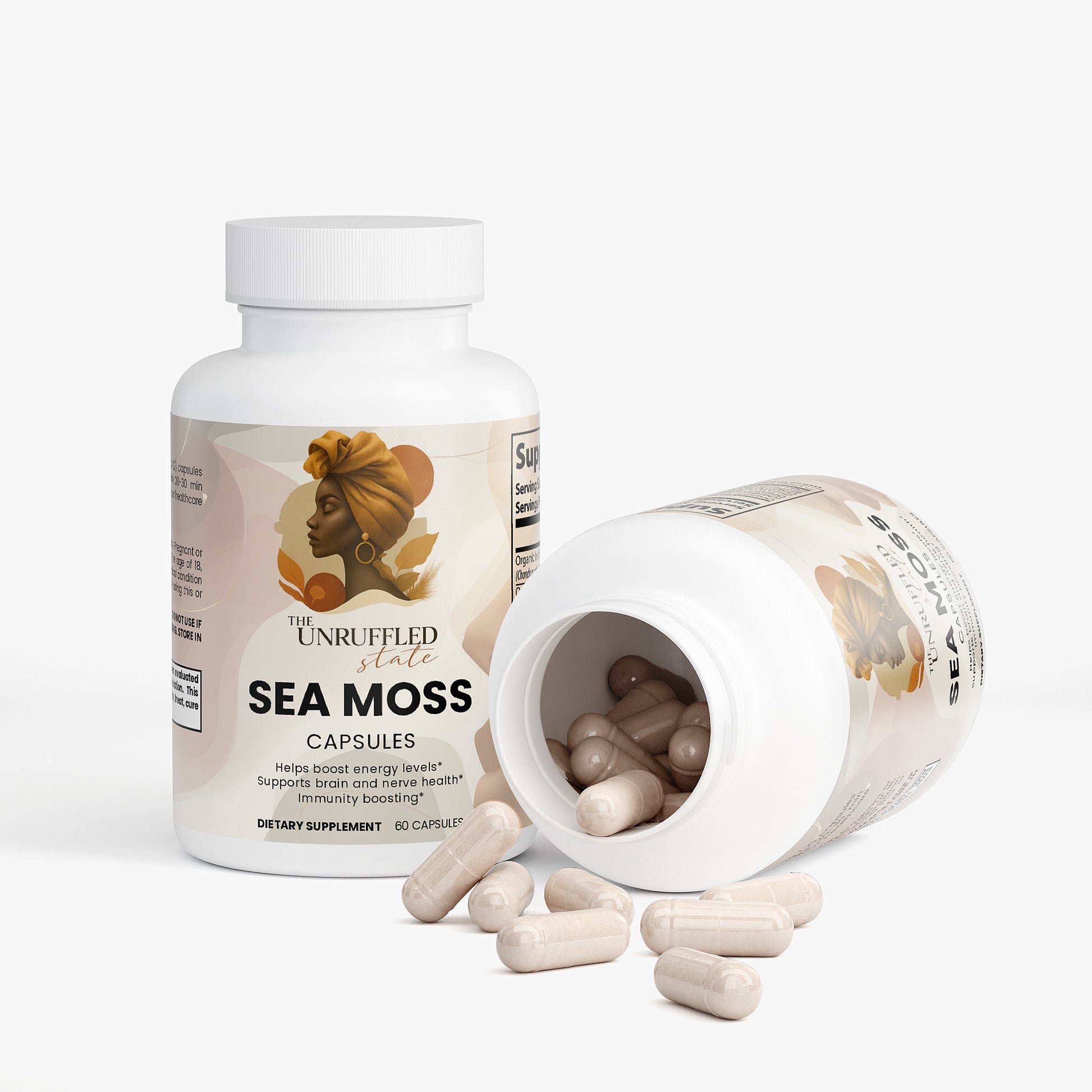 Two bottles of The Unruffled State Sea Moss capsules—one upright, one on its side with capsules spilling out. The label shows a woman in a headwrap and highlights organic bladderwrack and burdock root.